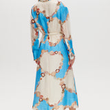 Azure Floral Printed Linen Blend Maxi Dress featuring a classic collar, long sleeves, button-front, and adjustable waist by Hilary Radley.
