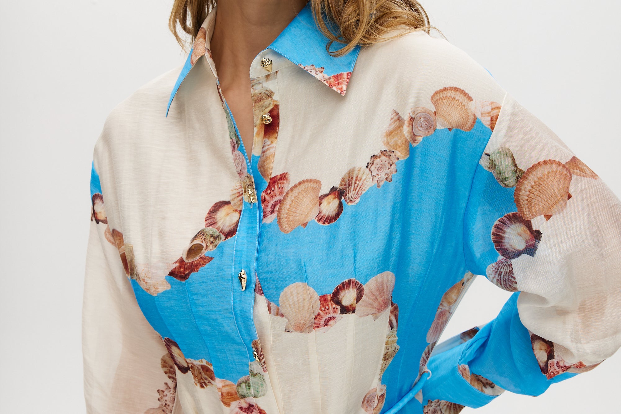 Azure Floral Printed Linen Blend Maxi Dress featuring a classic collar, long sleeves, button-front design, and adjustable waist by Hilary Radley.