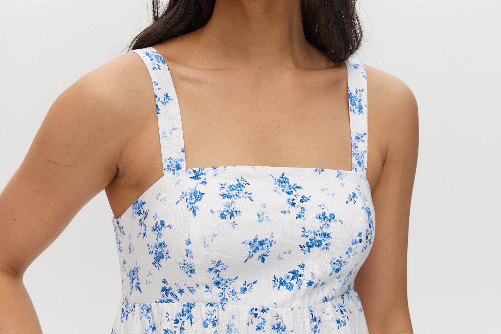 Sky Floral Printed Linen Midi Dress featuring a square neck and sleeveless design by Hilary Radley.