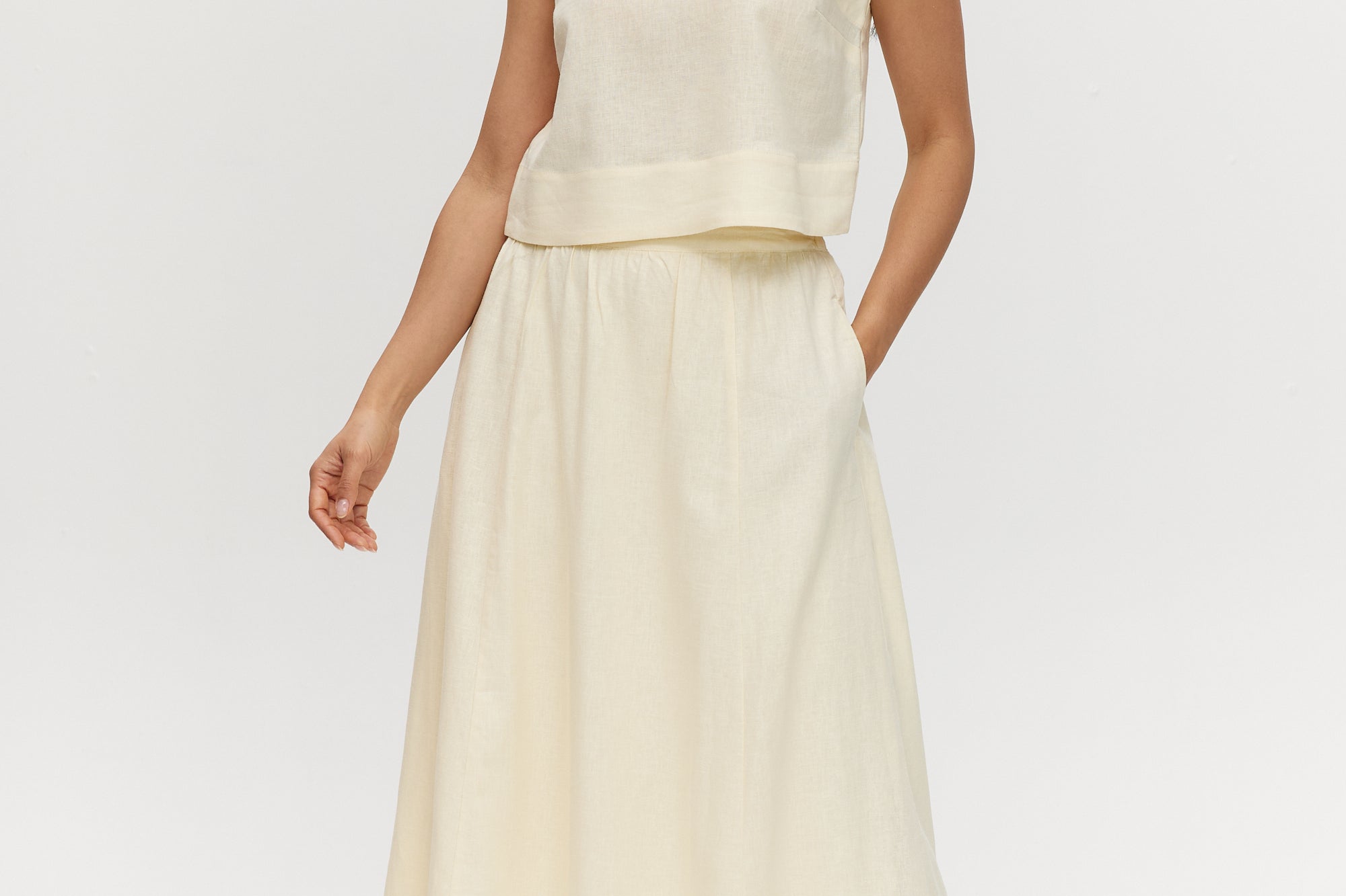 Yellow pleated linen blend midi skirt with pockets and elastic waistband