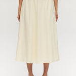 Yellow pleated linen blend midi skirt featuring pockets and an elastic waistband by Hilary Radley.