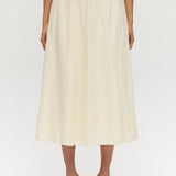 Yellow pleated linen blend midi skirt featuring pockets and an elastic waistband by Hilary Radley.