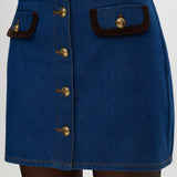Blue Contrast Trim Denim Mini Skirt featuring vegan leather trim and gold buttons by Hilary Radley.
