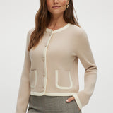 Beige knit cardigan with round collar and contrast trim