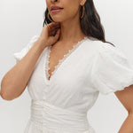 White Lace Hem Maxi Dress featuring a V-neckline and short balloon sleeves by Hilary Radley.