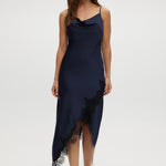 Navy satin cami dress with cowl neckline and lace trim.