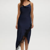 Navy satin cami dress with cowl neckline and lace trim.