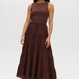 Woman wearing a brown skirt  on a white background