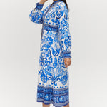 White and Blue Floral Linen Blend Midi Shirt Dress featuring a V-neckline, button front, crochet trim, and puff sleeves by Hilary Radley.