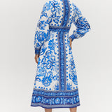 White and Blue Floral Linen Blend Midi Shirt Dress featuring a V-neckline, button front, crochet trim, and puff sleeves by Hilary Radley.