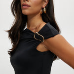 Black Asymmetrical One-Shoulder Top featuring elegant gold detail by Hilary Radley.