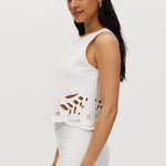 Off-White Embroidered Cotton Sleeveless Top featuring intricate embroidery and button-back closure by Hilary Radley.