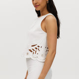Off-White Embroidered Cotton Sleeveless Top featuring intricate embroidery and button-back closure by Hilary Radley.