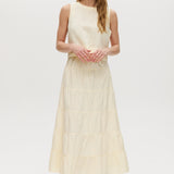 Yellow sleeveless cropped top featuring a crew neckline and tie-back detail by Hilary Radley.