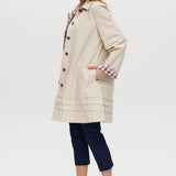 Hilary Radley Cream Reversible Plaid & Solid Trench Jacket featuring a button-front closure and relaxed fit, offering versatile style with plaid and solid sides.