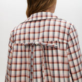 Cream Reversible Plaid & Solid Trench Jacket featuring a button-front closure and relaxed fit by Hilary Radley.