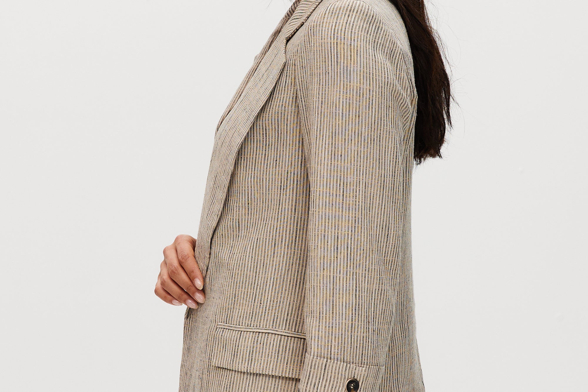 Beige striped yarn-dye linen blazer featuring 3/4 sleeves and a lapel collar by Hilary Radley.