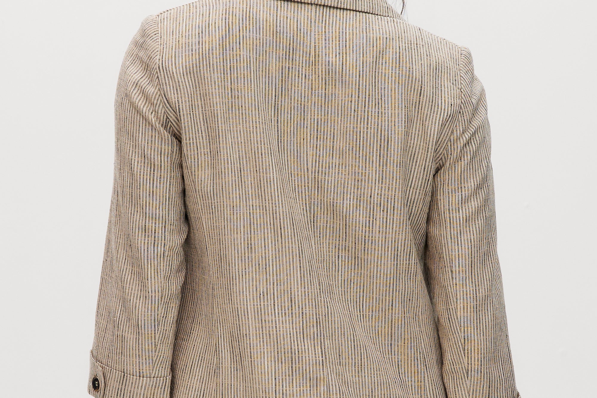 Beige striped yarn-dye linen blazer featuring 3/4 sleeves and a lapel collar by Hilary Radley.