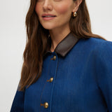 Blue Denim Jacket featuring contrast trim and gold buttons by Hilary Radley.