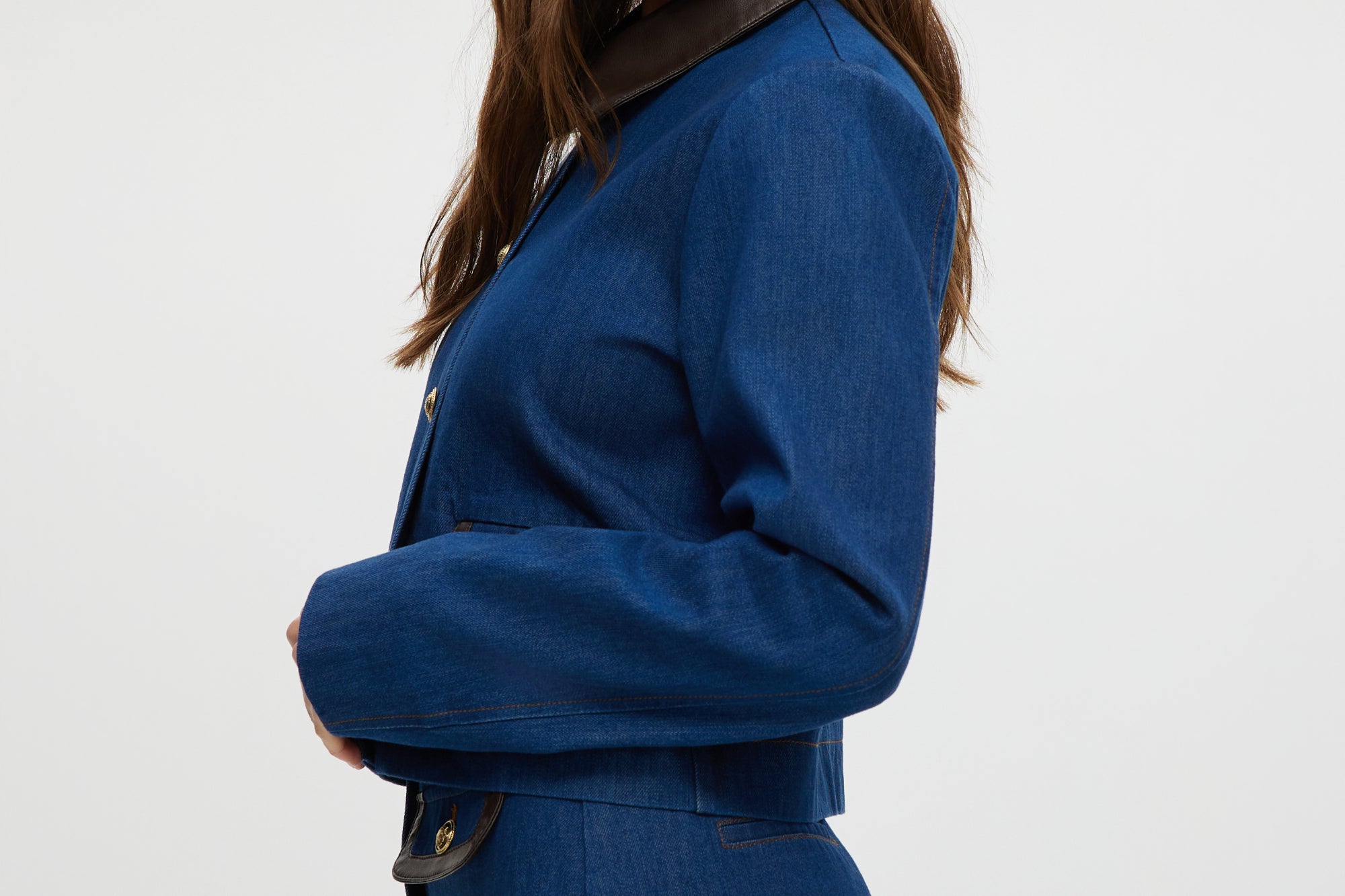 Blue Denim Jacket featuring contrast trim and gold buttons by Hilary Radley.