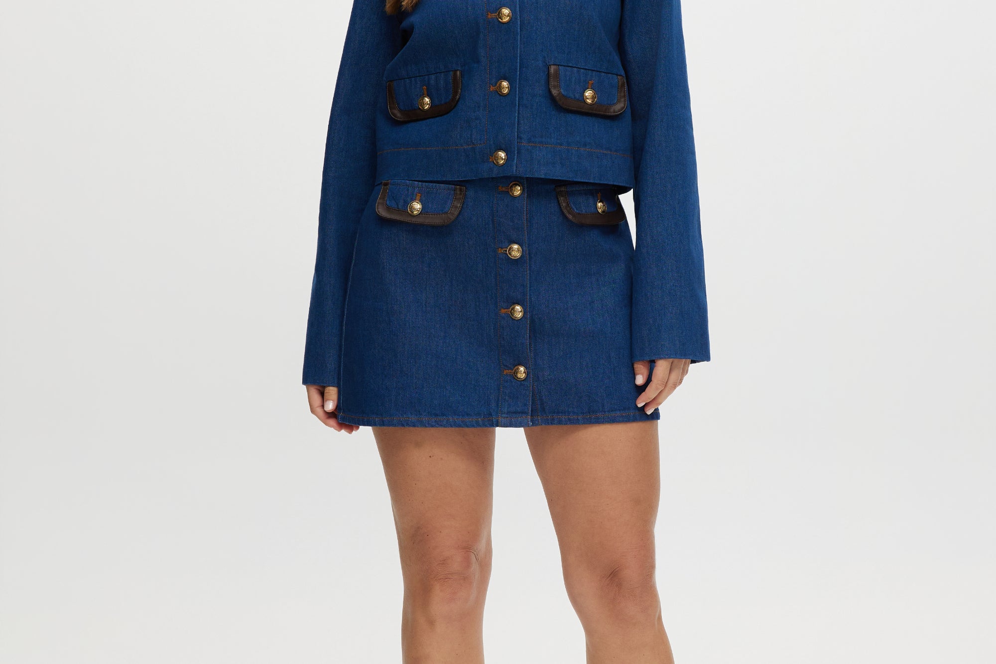 Blue Denim Jacket with contrast trim and gold buttons, offered by Hilary Radley.