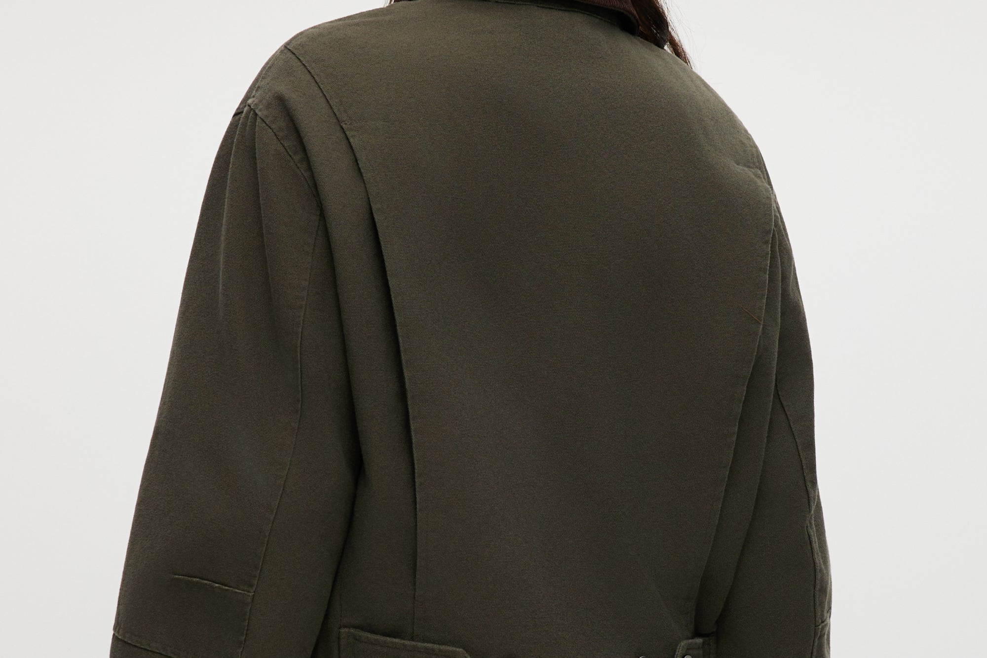 Olive Green Cotton Canvas Cropped Jacket with contrasting collar, zip-front closure, and patch pockets by Hilary Radley.