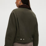 Olive Green Cotton Canvas Cropped Jacket with contrasting collar, zip-front closure, and patch pockets by Hilary Radley.