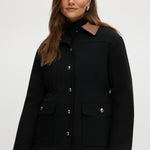 Black utility jacket with brown contrast collar and flap pockets.