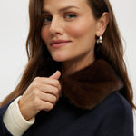 Navy wool-like boxy jacket featuring a removable faux fur collar and silver-tone buttons by Hilary Radley.