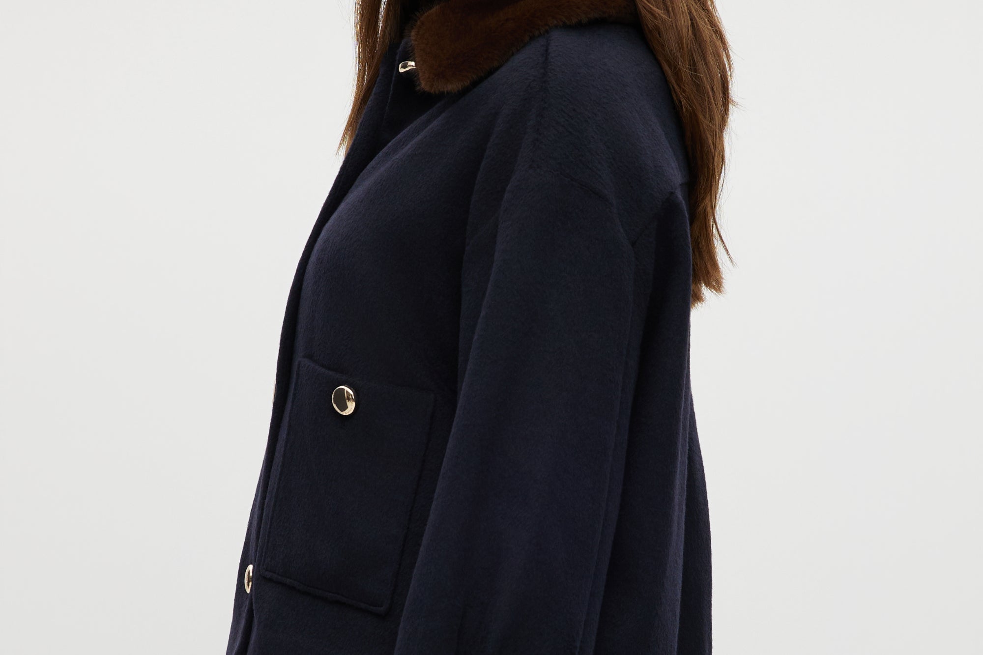 Navy wool-like boxy jacket featuring a removable faux fur collar and silver-tone buttons by Hilary Radley.