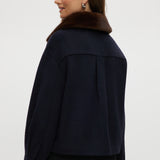Navy wool-like boxy jacket featuring a removable faux fur collar and silver-tone buttons by Hilary Radley.