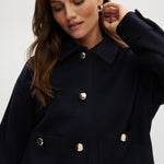 Navy wool-like boxy jacket featuring a removable faux fur collar and silver-tone buttons by Hilary Radley.