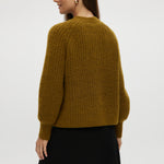 Mustard shaker stitch raglan cardigan featuring a button closure and ribbed texture by Hilary Radley.