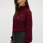 Burgundy Smocked Lace Mock Neck Top featuring a delicate lace design with smocked neckline and cuffs by Hilary Radley.