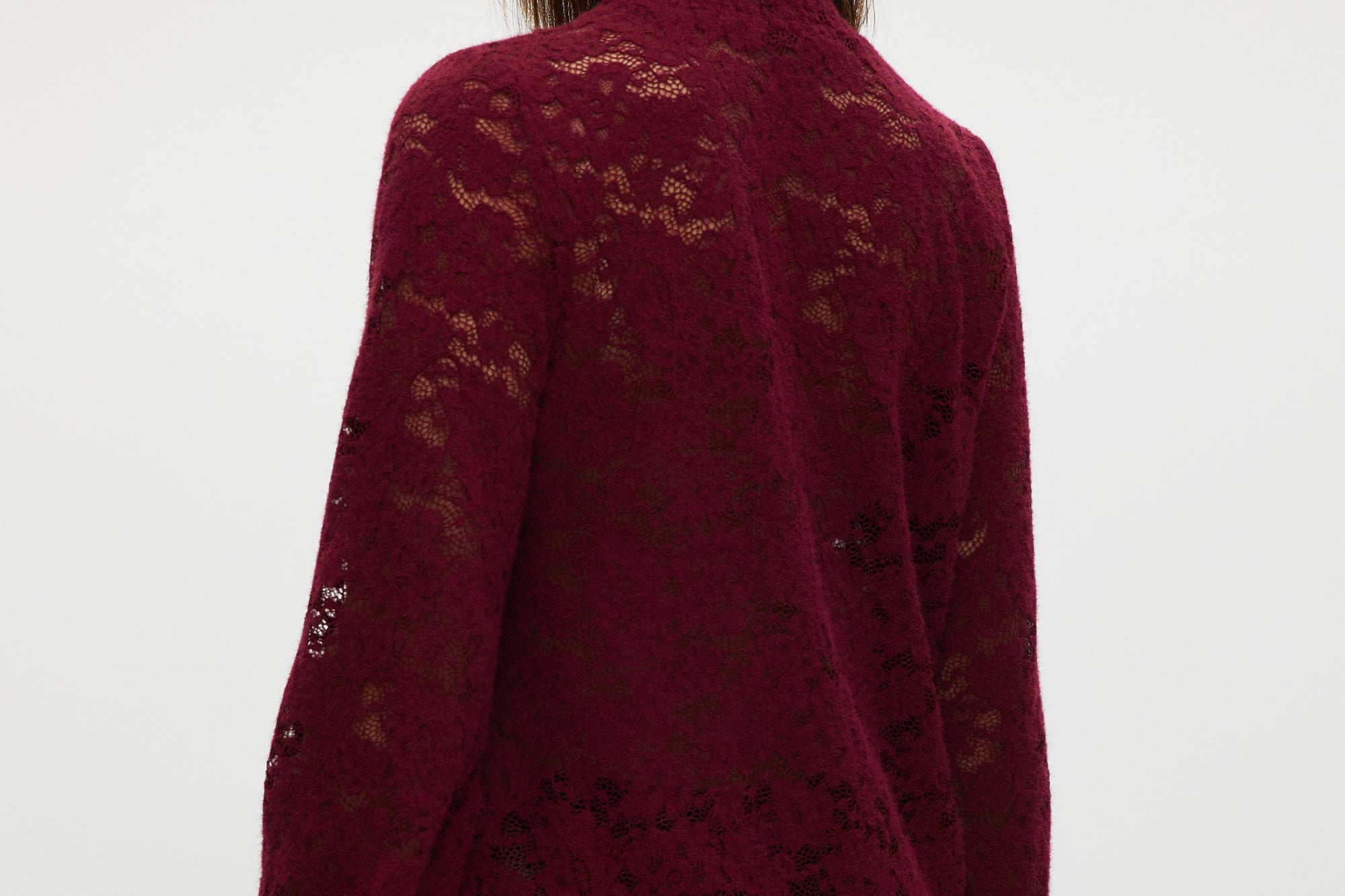Burgundy Smocked Lace Mock Neck Top featuring a smocked neckline and cuffs, available from Hilary Radley.