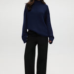 Navy rolled neck cotton sweater featuring ribbed details and an oversized fit by Hilary Radley.