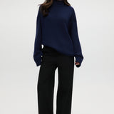 Navy rolled neck cotton sweater featuring ribbed details and an oversized fit by Hilary Radley.