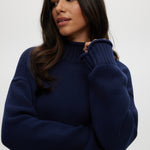 Navy rolled neck cotton sweater featuring ribbed details and an oversized fit by Hilary Radley.