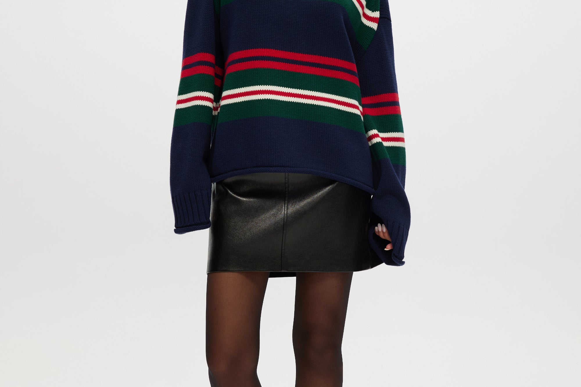Navy Stripe Rolled Neck Sweater featuring red, green, and white stripes with a high neck and long sleeves by Hilary Radley.