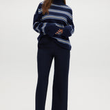 Navy striped rolled neck sweater with long sleeves and a relaxed fit by Hilary Radley.
