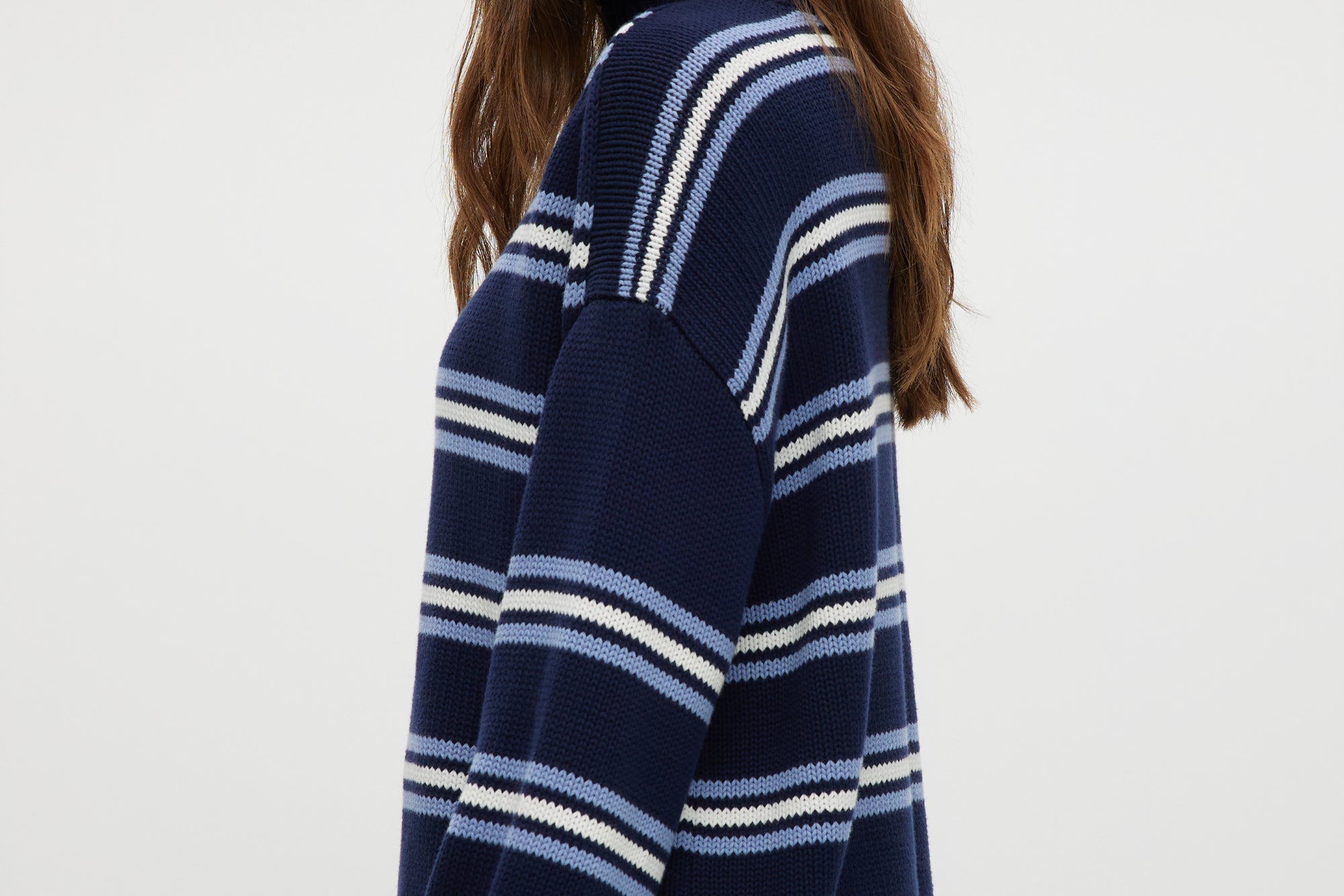 Navy striped rolled neck sweater featuring long sleeves and a relaxed fit by Hilary Radley.