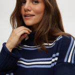 Navy striped rolled neck sweater featuring long sleeves and a relaxed fit by Hilary Radley.