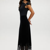 Black velvet midi skirt with elegant lace hem and pull-on design by Hilary Radley.