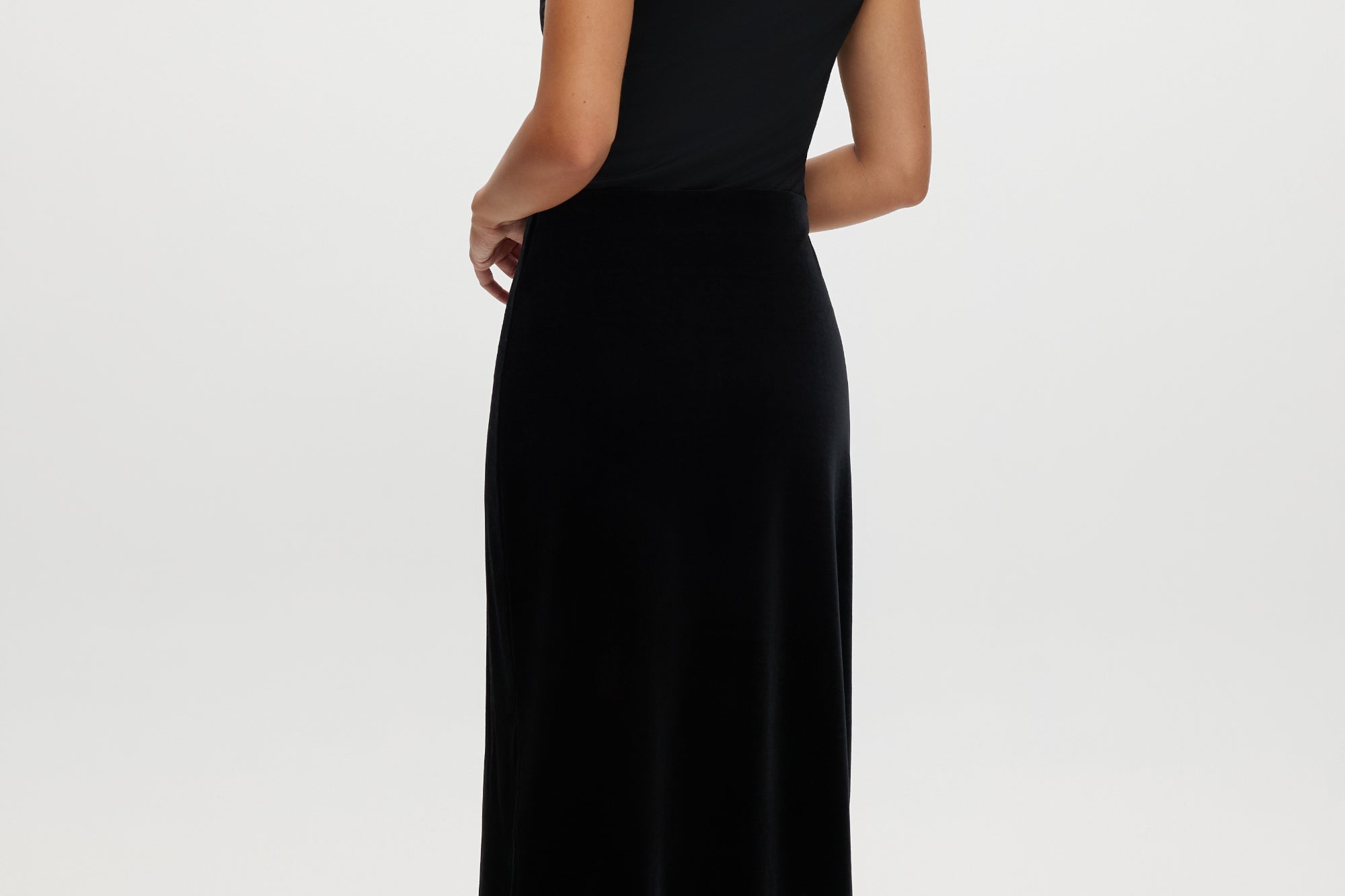 Black Velvet Midi Skirt featuring a lace hem and pull-on design by Hilary Radley.