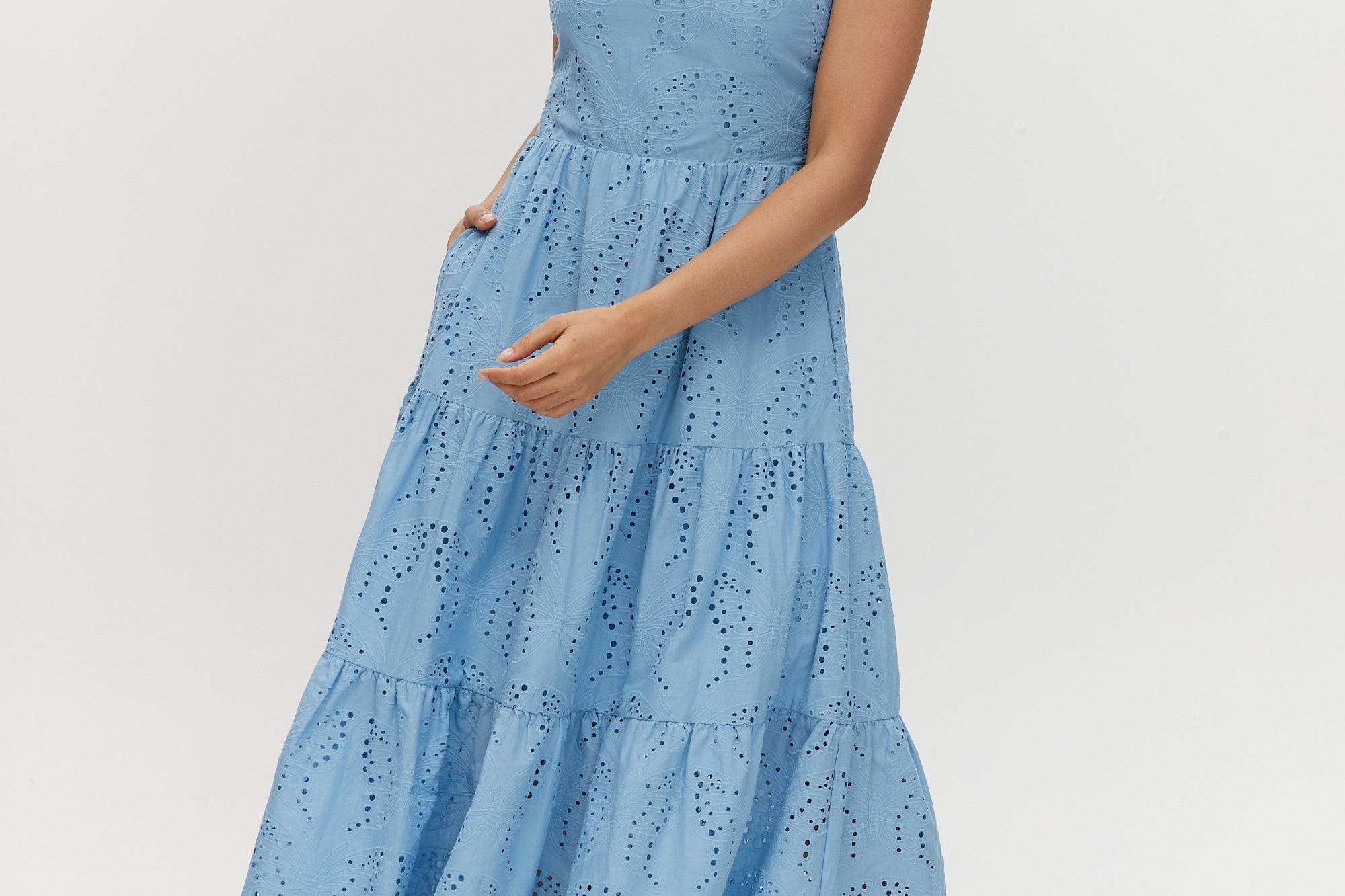Sky Cotton Eyelet Tiered Maxi Dress with adjustable straps and scalloped hem.