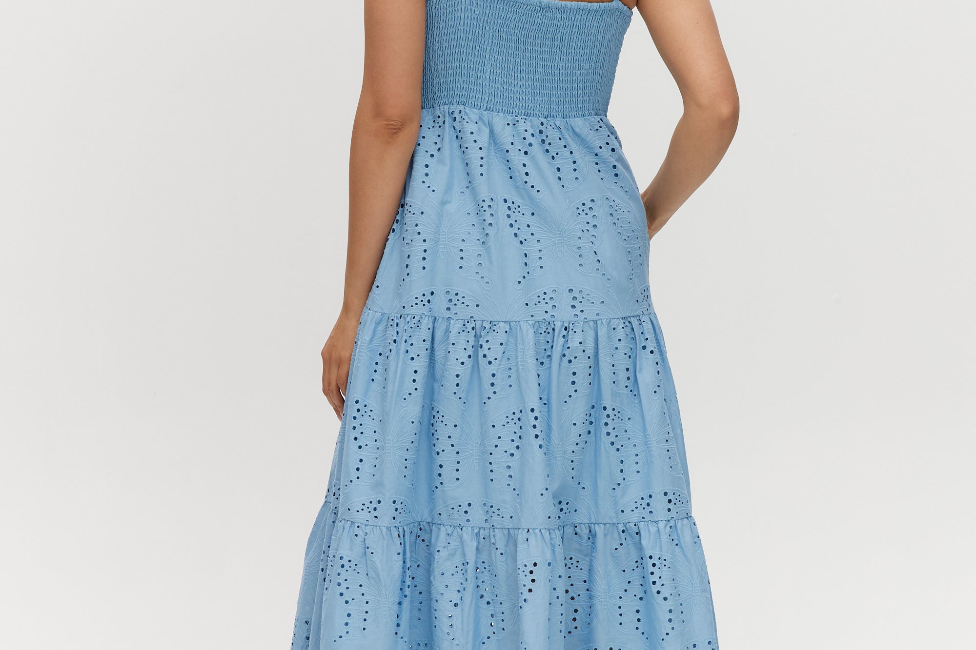 Sky Cotton Eyelet Tiered Maxi Dress featuring adjustable straps and a scalloped hem by Hilary Radley.